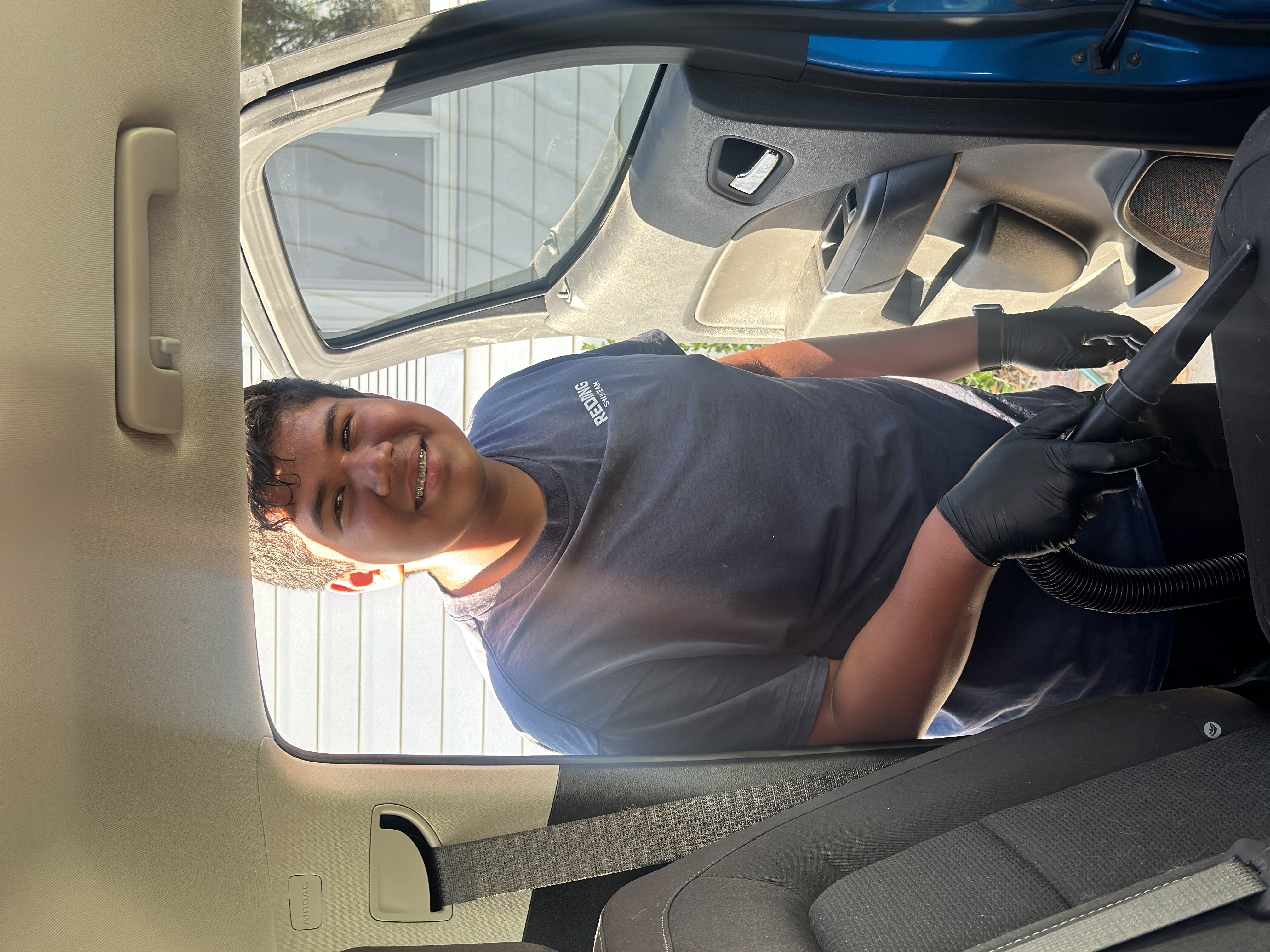 Jonah working on a vehicle interior