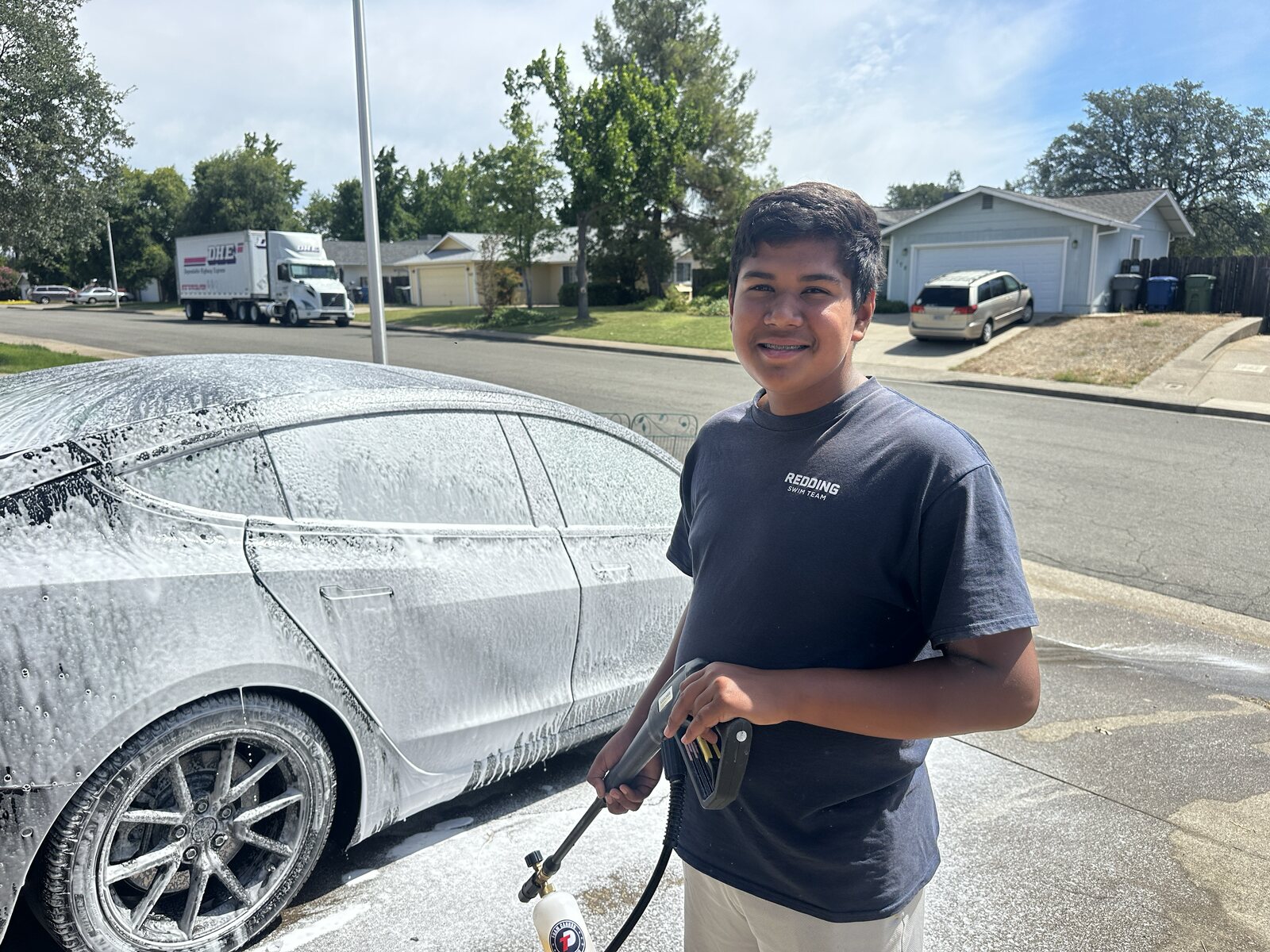 Jonah washing a car